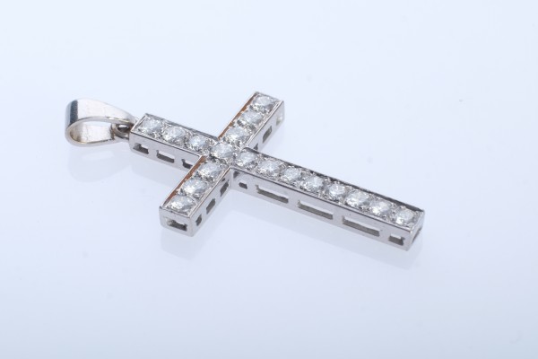 Kreuz-Anhänger Bucherer, besetzt mit 18 Brillanten, jeweils um 0,05ct, gesamt ca. 1ct, 750 Weißgold, punziert, Goldschmiedestempel 